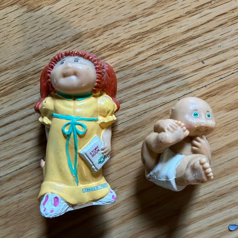 Vibrant Yellow and Red Doll with Playful Accessories